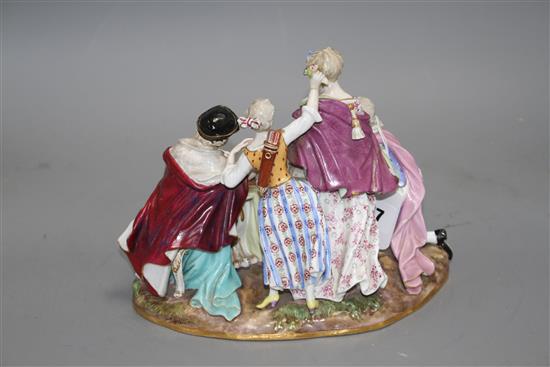 A Meissen group of an elegant lady with attendants, width 23cm, height 19cm